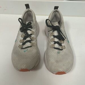 Nike white, orange, and blue Sneakers